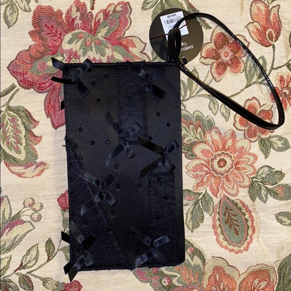 Brand new Neiman Marcus black embellished clutch